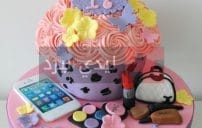 17 Birthday giant cupcake with iphone MAC make up and chanel bag