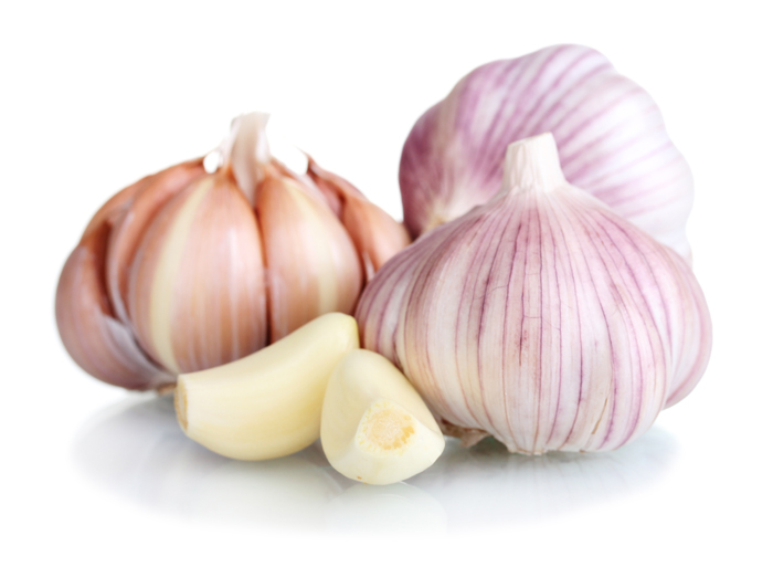 fresh garlic isolated on white